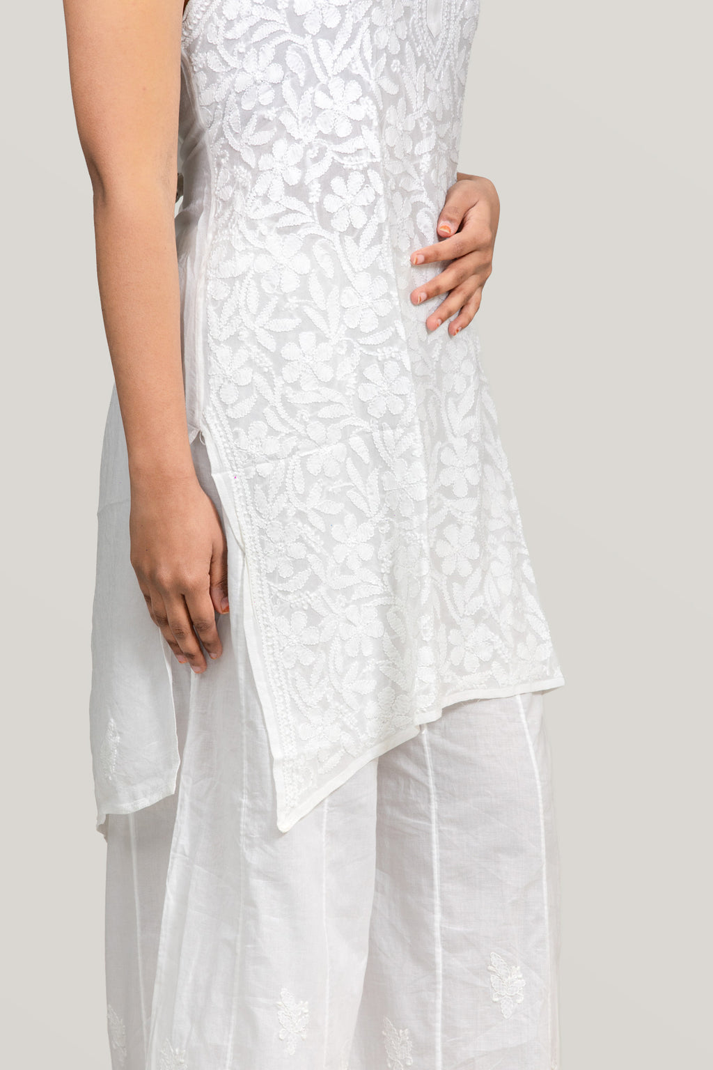 Pure Viscose White-on-White Chikankari Sleeveless Short Kurti